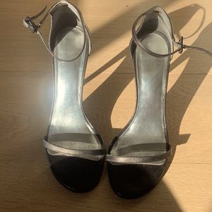 Stuart Weitzman nudist curve black leather sandal